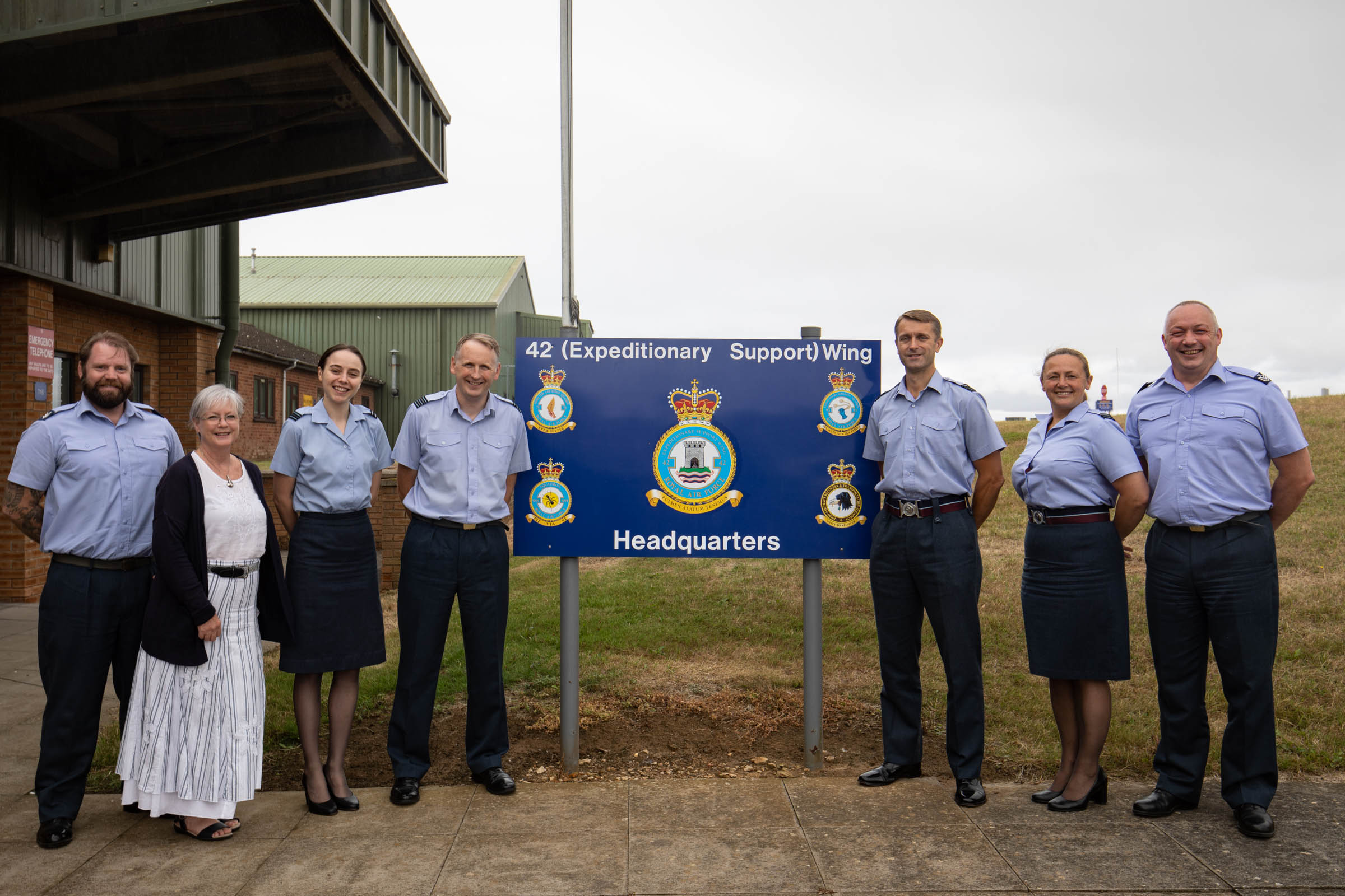 From left to right: The 42 Wing headquarters team, Sgt Peter Gwilliam, Mrs Carol Croft, Flt Lt Grace Paine, Wg Cdr Matt Smith, Wg Cdr Mike Dutton, Flt Lt Miriam Aicheler and Chief Tech Phil Meagre